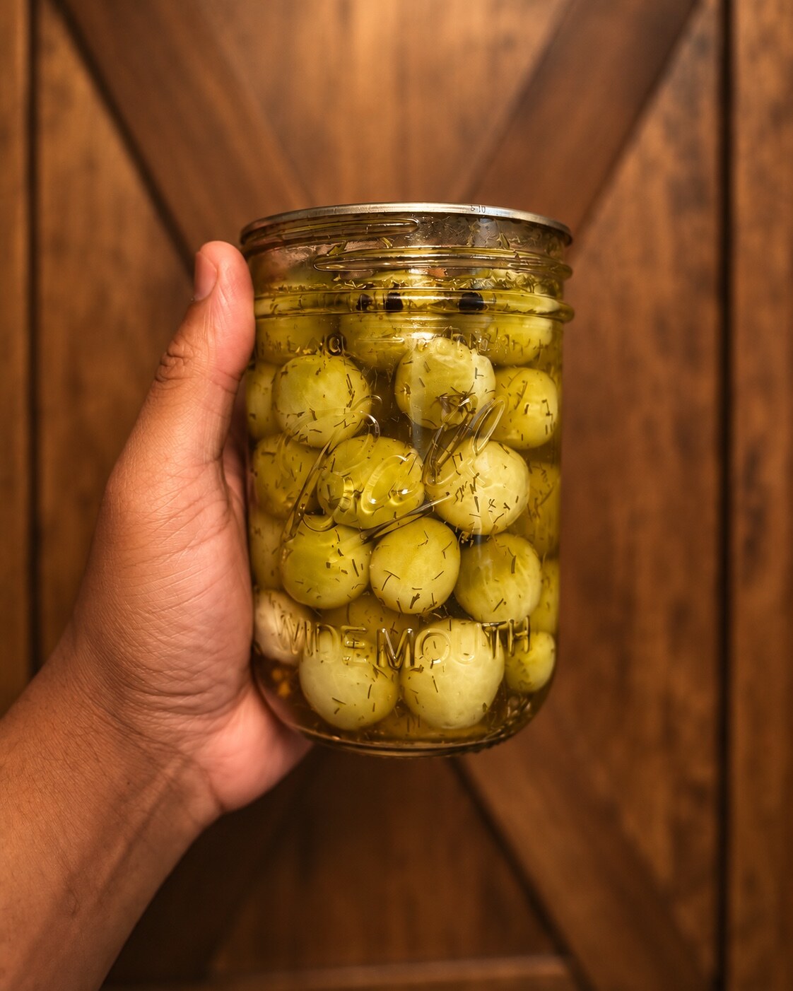 Dill pickled green cherry tomatoes